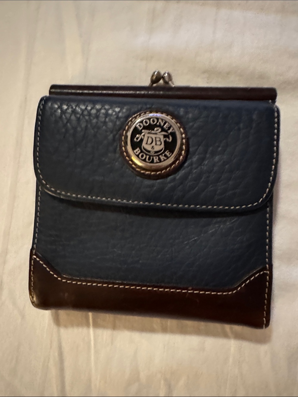 Dooney & Bourke Navy Leather Wallet with Brown Trim and Brass Logo